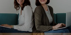 IT professional at computer reviewing job market trends — IT jobs 2023