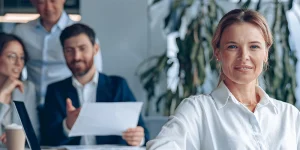 Confident leader guiding team — cultivating leadership traits for career success