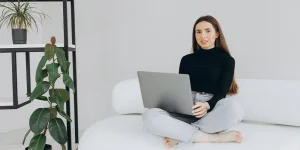 Professional applying resume writing rules on laptop — 2023 resume guide