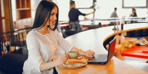 Professional crafting resume headline on laptop — effective resume headline tips