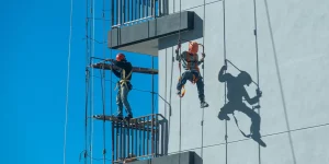 Worker in protective gear at hazardous job site — most dangerous jobs in America