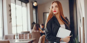 Professional demonstrating value at work to increase job security during layoffs