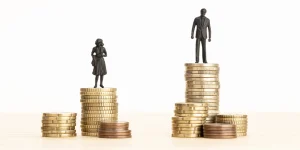 Businesswoman reviewing pay equity report — UN findings on women jobs and wages