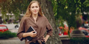 Recruiter smiling while reading strong resume — signs your resume is working