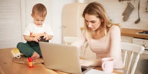 Stay-at-home parent working from home — best jobs for parents re-entering workforce 2023