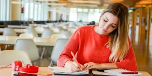 Professional creating custom resume template on laptop — 7 steps to build your own template