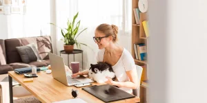 Remote worker maintaining healthy work life balance from home office — remote balance tips