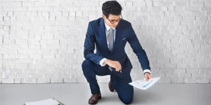 Professional reviewing financial workplace benefits package — types of employee financial benefits