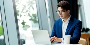 Hiring manager reviewing top of resume — what they notice first on any application