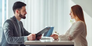 Confident job candidate preparing for interview — job interview tips to impress hiring managers