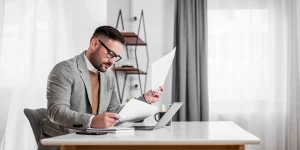 Job seeker reviewing resume strategies to land more interviews — get more interviews resume tips