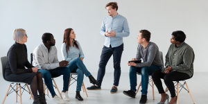 Career coach consulting with client reviewing career plan — career coach benefits