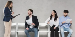 Job candidate reviewing interview cheat sheet before meeting — job interview cheat sheet