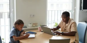 Professional returning to workforce reviewing updated resume — return to work resume success