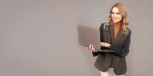 Senior executive reviewing polished resume format at desk — executive resume format