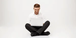 Professional reviewing resume tips on notepad — Top Ten Resume Tips to Make Your Job Application Stand Out