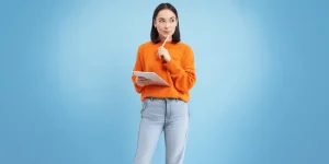 Professional holding trophy showcasing resume achievements — Ten Types of Achievements to Make Your Resume Stand Out