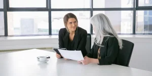 Person reviewing resume on laptop checking ATS compatibility — Is Your Resume ATS-Friendly?