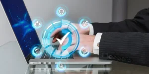 Person clicking a laptop with digital job search icons and checkmarks — how to find a job faster using smart job search strategies