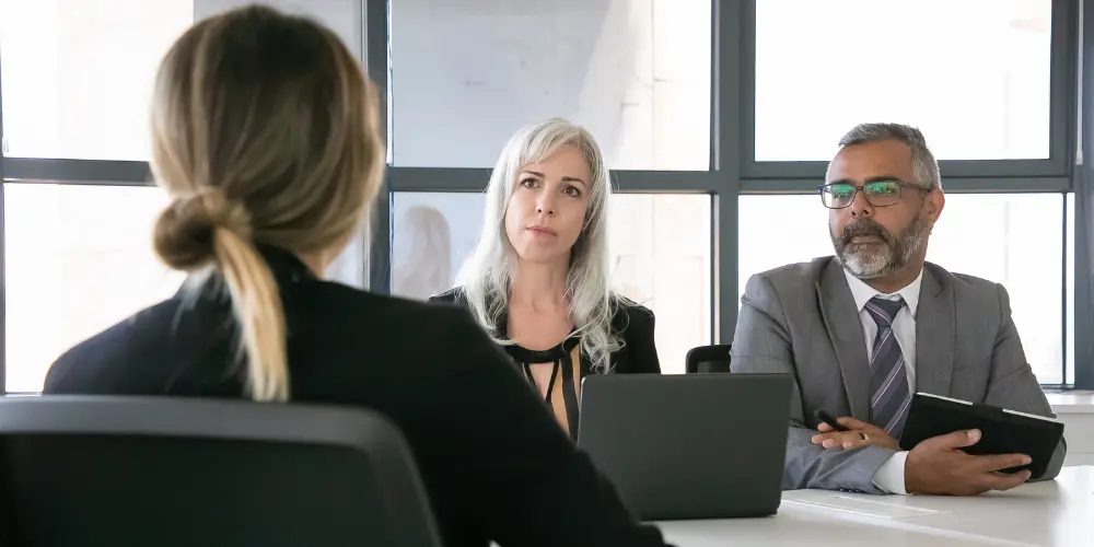 Job candidate being interviewed by two hiring managers — 7 resume tips to capture interviewers' attention